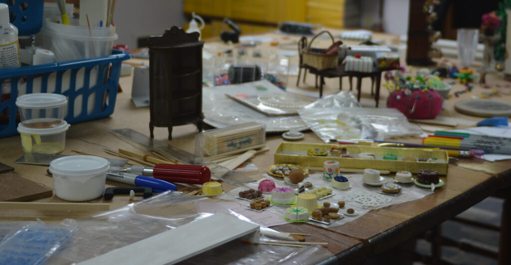 Messy worktable full of crafts